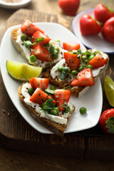 Homemade strawberry bruschetta with green pea