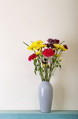 single Vase of Flowers on Shelf