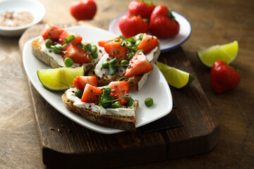 Homemade strawberry bruschetta with green pea