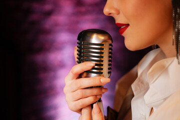 Singer lips and retro microphone. Sensual performance of the song.