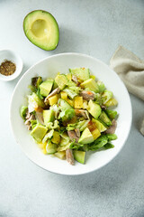 Healthy salad with duck, pineapple and avocado