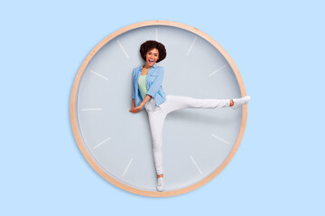 Photo image of funny lady stuck inside huge large clock use her legs instead of arrows have fun concept of time arrangement every second have cost - Powered by Adobe