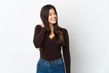 Teenager Brazilian girl isolated on white background laughing