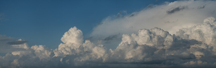 Panoramic view of cumulus clouds, summer sky