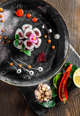 Obraz na płótnie Canvas fish sushi roll in plate