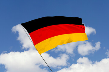 3d illustration. A beautiful view of Germany flag on a blue sky background.