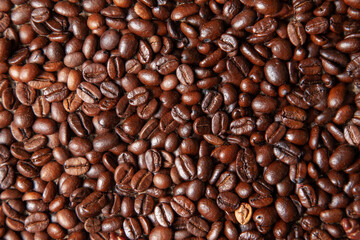 Roasted coffee beans, dark roasted coffee beans background.