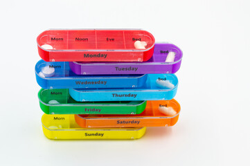 colored container with pills for every day
