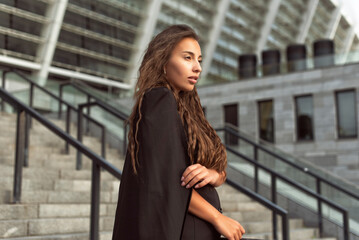 Obraz premium Girl dressed in business style