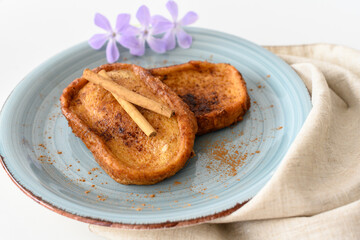 Traditional homemade Spanish Torrijas. Easter dessert of bread with milk and cinnamon.
