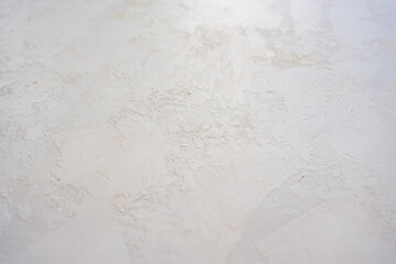 artistic plaster on a gray and white wall. Repairs. elements of wall decor. copy space. texture. background.