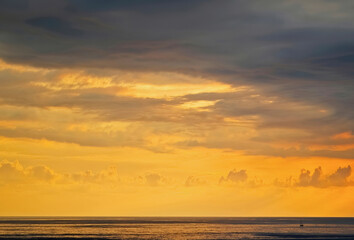Fototapeta na wymiar Summer sunset after a thunderstorm over the sea