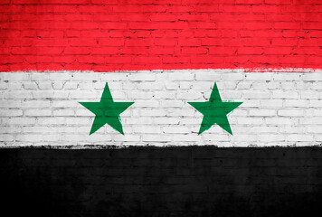 Syria flag painted on brick wall. National country flag background photo
