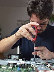 The man repairing broken tv 