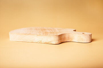Wooden cutting board. Kitchen utensils concept. Food cooking tool. High quality photo