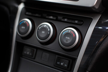 Car climate control panel for driver and passenger.