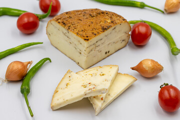 Smoked cheese on a white background. Delicious assortment of cheeses. close up