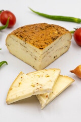 Smoked cheese on a white background. Delicious assortment of cheeses. close up