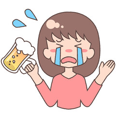 ジョッキビールを持つ泣き上戸の成人女性