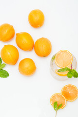 Fototapeta na wymiar Fresh Citrus Fruit. Lemon, Orange, Mandarin, Grapefruit on Solid White Colored Background.