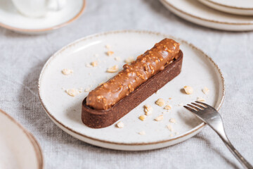 Chocolate cake bar with hazelnut crumbs on top