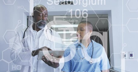 Animation of chemical symbols over african american male and female doctors - Powered by Adobe