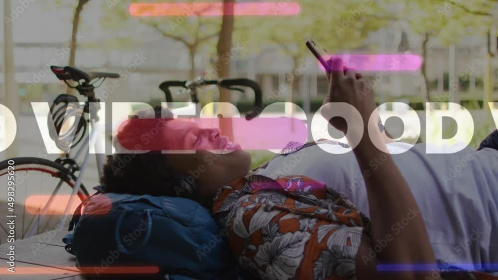Poster animation of vibes text over smiling african american man using smartphone