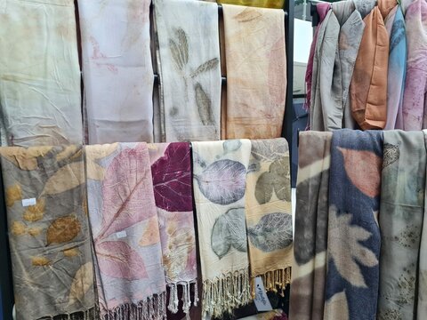 batik cloth in a cloth shop. ecoprint batik with leaf and flower motifs and abstract motifs. Indonesian batik motifs