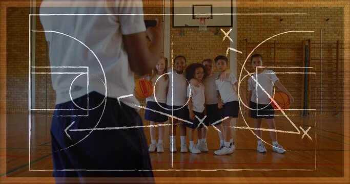 Animation of drawing of game plan over diverse children playing basketball