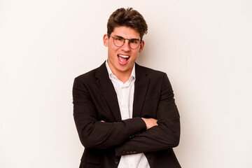 Young caucasian business man isolated on white background laughing and having fun.