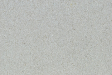 A sheet of gray recycled cardboard texture as background