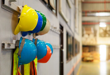 Old and new colorful construction protective  helmets or safety hardhat helmet. Safety first.