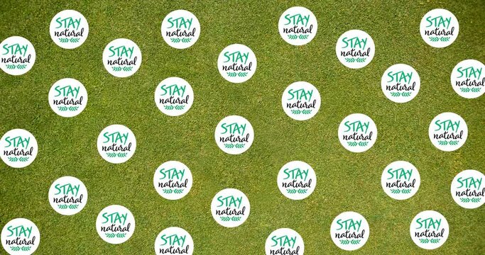 Animation of stay natural text over plants and grass
