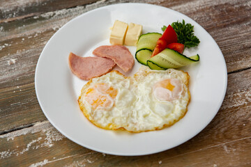 Ideal breakfast with pancakes and eggs. 