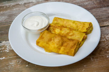 Ideal breakfast with pancakes and eggs. 