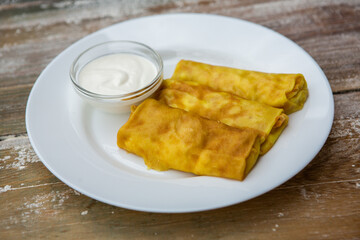 Ideal breakfast with pancakes and eggs. 