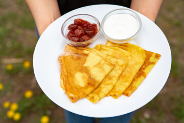 Ideal breakfast with pancakes and eggs. 