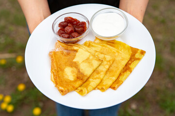 Ideal breakfast with pancakes and eggs. 
