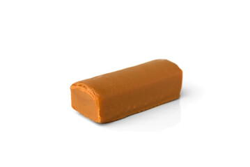 Cottage cheese bars in caramel glaze isolated on white background.