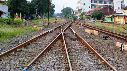 Fototapeta na wymiar railroad tracks near the Sidoarjo train station, Indonesia