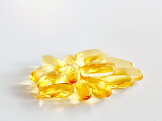 Closeup of a lot of omega 3 oil capsules