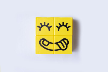 Smile Emoji showing tongue isolated on white background. Positive concept