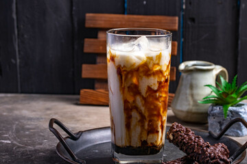 Iced Brown Sugar Fresh Milk Drink in a Clear Glass