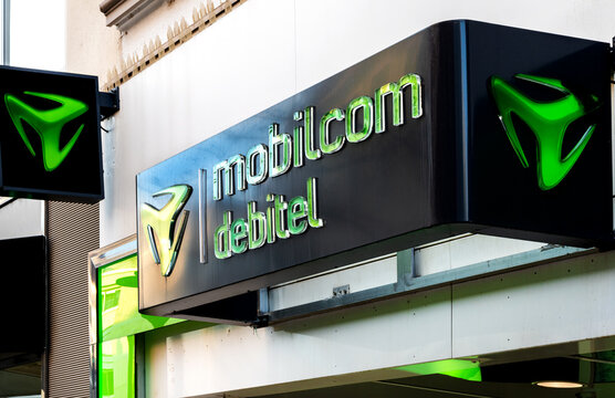 Aschaffenburg, Germany, 2022: Branch logo of Mobilcom Debitel. Debitel AG is one of the largest mobile telephone services providers in Europe