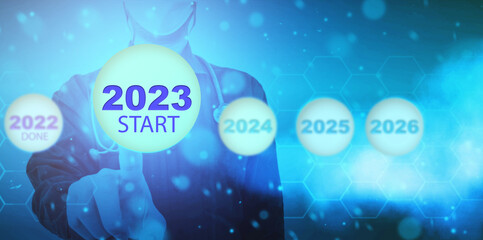 man press start 2023 new year button