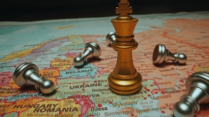 Ukraine and Russia Conflict. King and pawns on the map. - Powered by Adobe