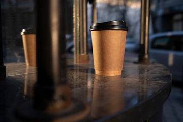 Craft paper coffee cups outdoors. High quality photo