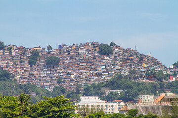Fototapeta na wymiar Rocinha favela seen from Rodrigo de Freitas Lagoon in Rio de Janeiro, Brazil.
