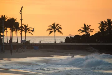 Fotobehang sunrise at arpoador beach in Rio de Janeiro. © BrunoMartinsImagens