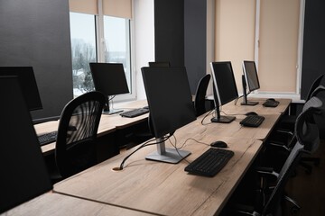 Many modern computers in open space office